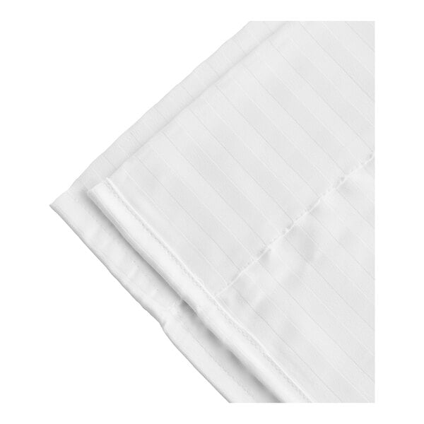 A close-up of a white fabric with a stripe pattern.