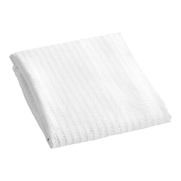 A folded white Berkshire Hospitality Derby top sheet on a white surface.