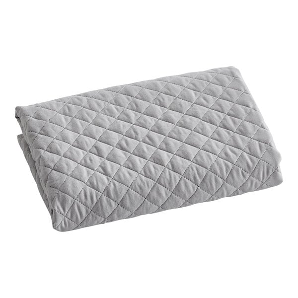 A grey pillow sham with diamond quilt pattern.
