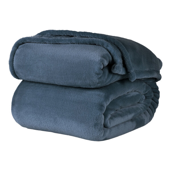 A stack of Berkshire Hospitality Cadet Blue VelvetLoft blankets.