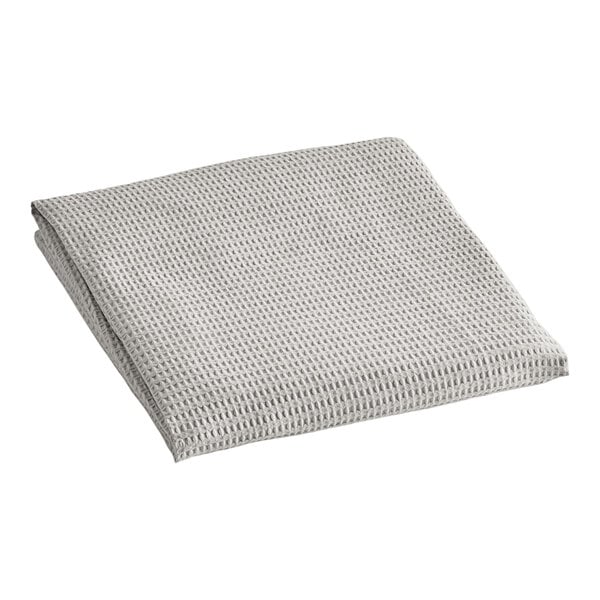 A gray Berkshire Hospitality top sheet with a white pucker jacquard pattern.
