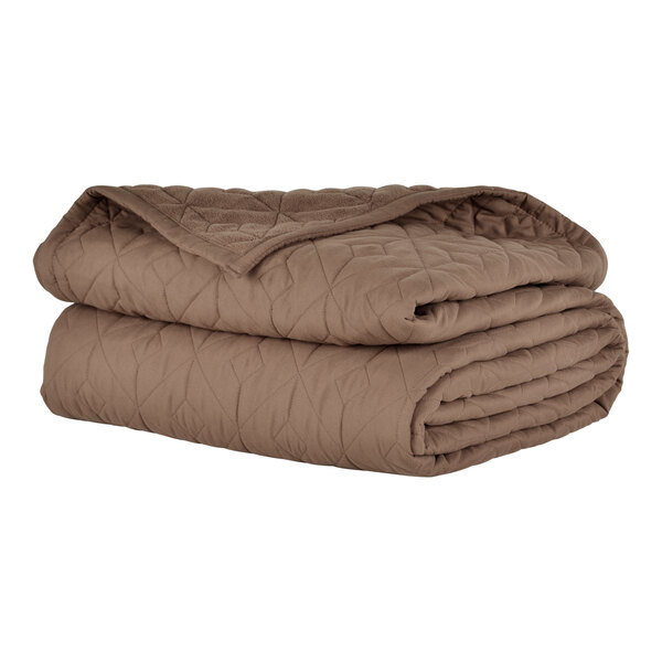 A stack of brown Berkshire Hospitality CozyCare Designs twin size fitted coverlets.