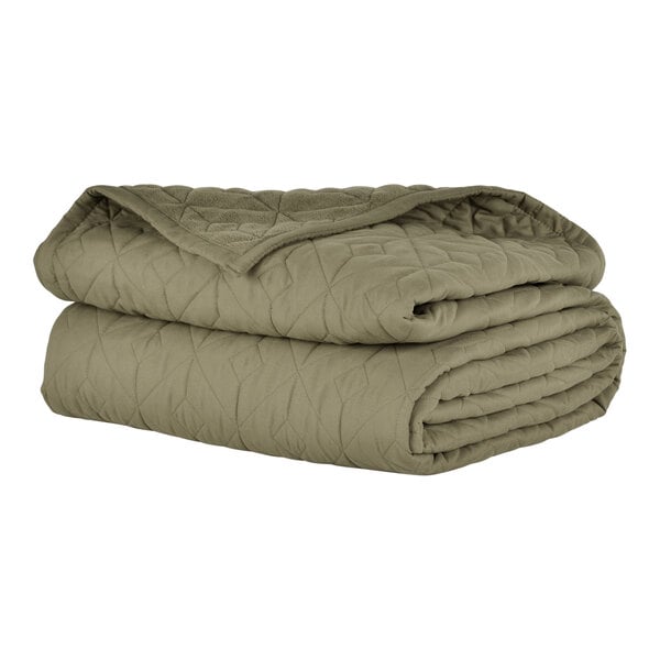 A stack of Berkshire Hospitality CozyCare Designs moss green bedspreads.