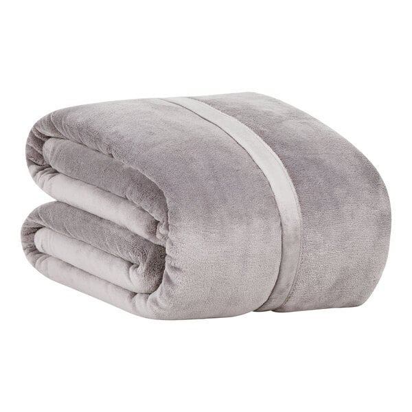 A folded gray Berkshire Hospitality Serasoft+ twin size blanket.