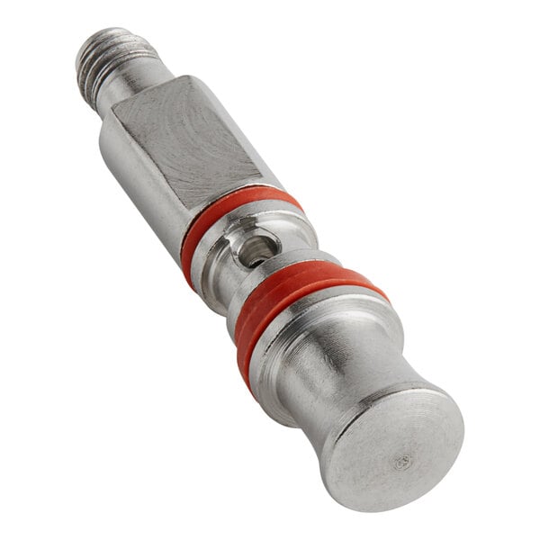 A silver Whip-It piston valve with red rubber rings.