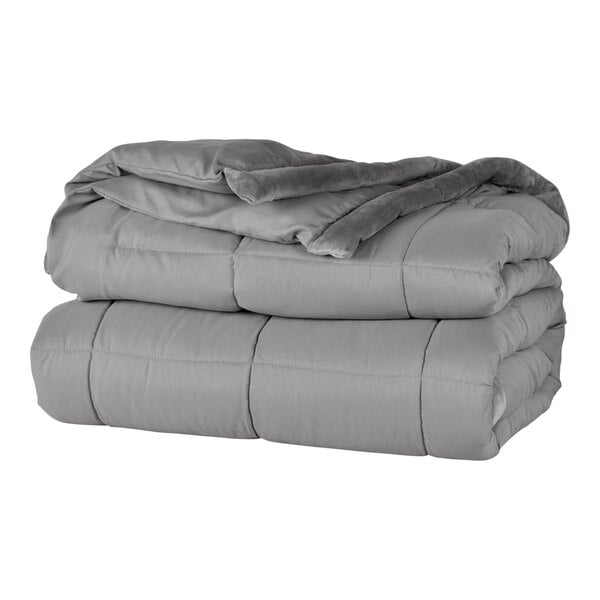 A stack of grey Berkshire Hospitality king size blankets.