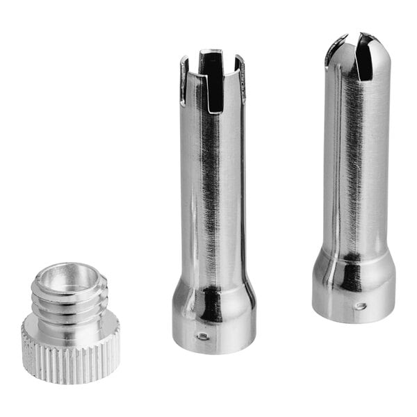 A close-up of a Whip-It stainless steel decorating tip set with three metal tubes and a metal nut.