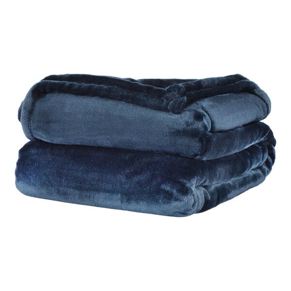 A stack of navy Berkshire Hospitality throw blankets.