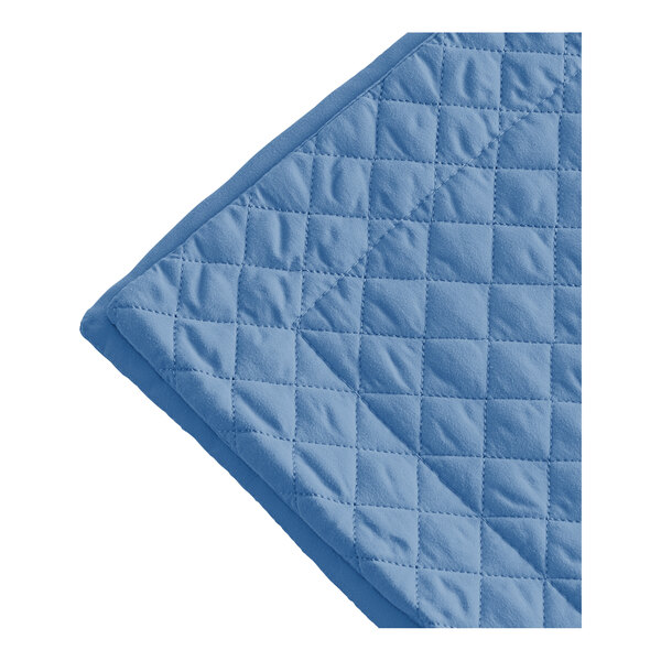 A close up of a Berkshire Hospitality Persian Blue diamond quilt pillow sham.