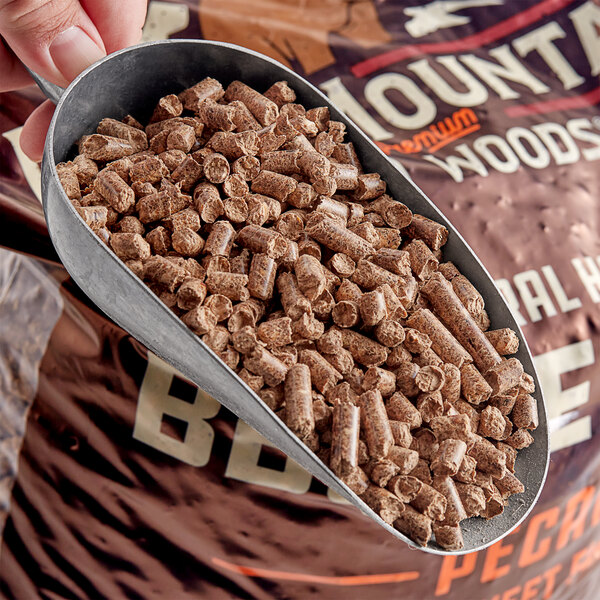 A scoop of Bear Mountain Pecan BBQ wood pellets.