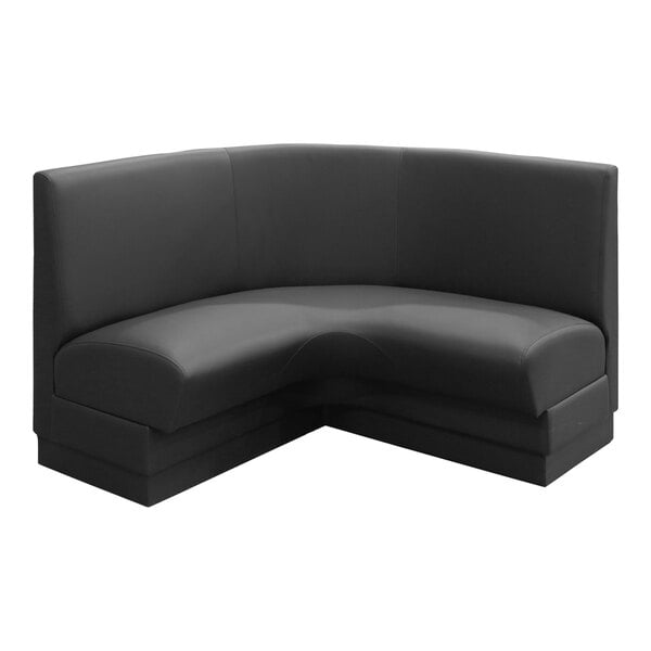 A black leather QA Group corner booth with a curved back.