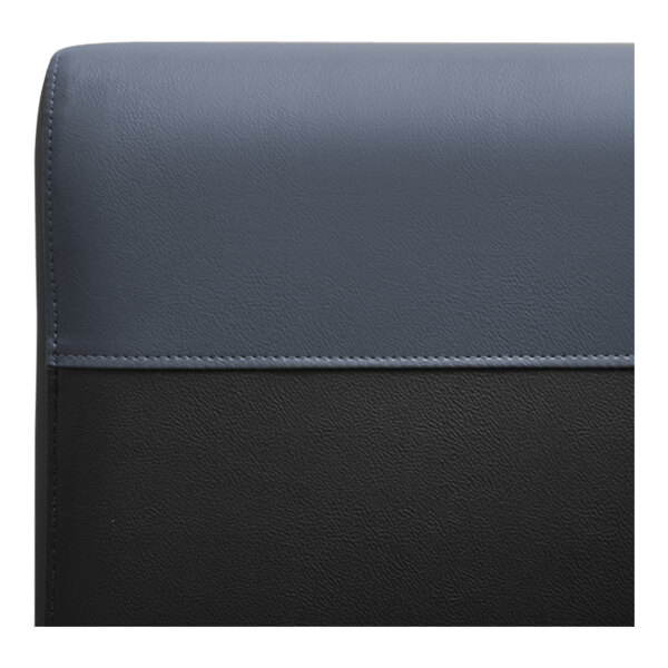 A QA Group graphite colored single back booth with a roll headrest.