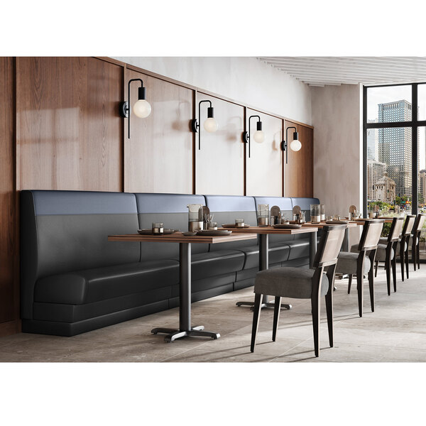 A QA Group long graphite single back booth at a table in a restaurant dining area.