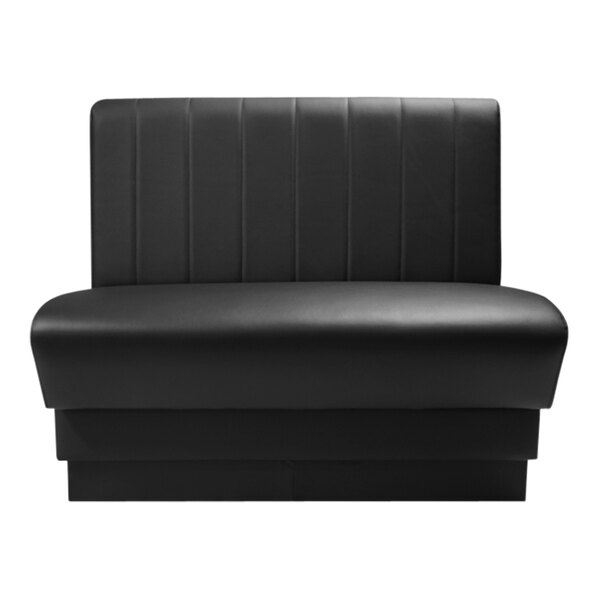 A black leather booth with a black back.