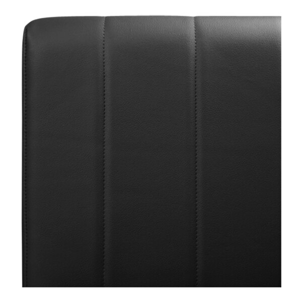 The back of a black leather QA Group restaurant booth with a white border.