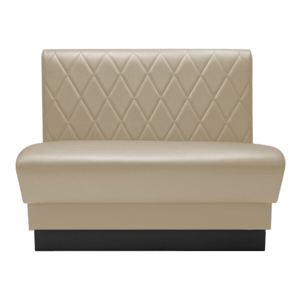 A beige leather booth with a diamond tufted back and black trim.