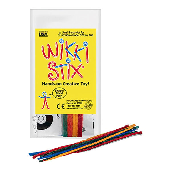 A yellow Wikki Stix Mini Play Pack case with red and blue text holding colorful rainbow Wikki Stix.