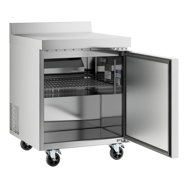 An Avantco stainless steel worktop refrigerator with a door open.