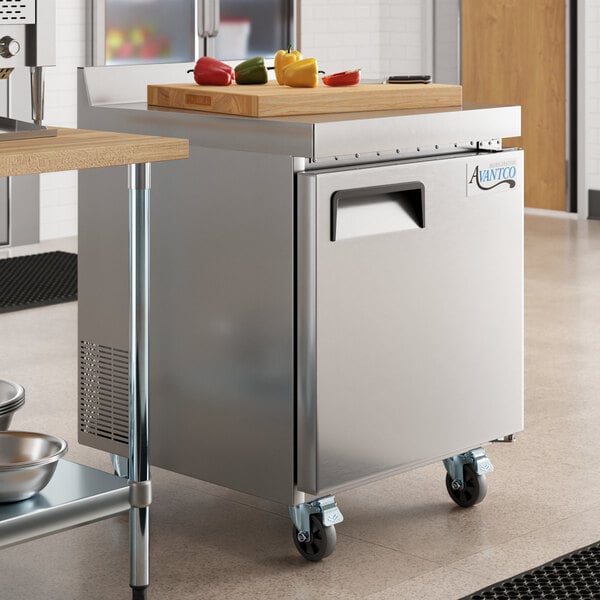 An Avantco stainless steel worktop freezer on a counter.