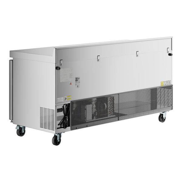 An Avantco stainless steel worktop refrigerator with wheels.