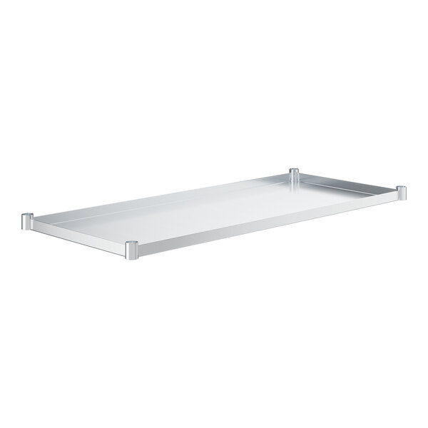 A galvanized metal undershelf for a work table with a white background.