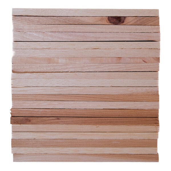 A stack of Wildwood Grilling hickory wood planks.