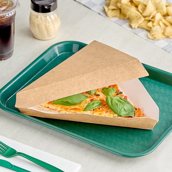 A pizza in a Choice Kraft cardboard box on a white surface.