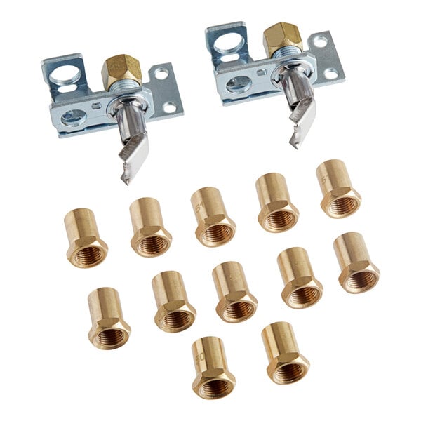 A group of brass and metal parts including screws and nuts.