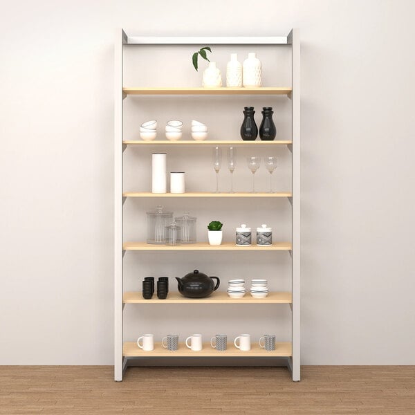 An Econoco wall-mount retail display shelf with six shelves holding various objects.