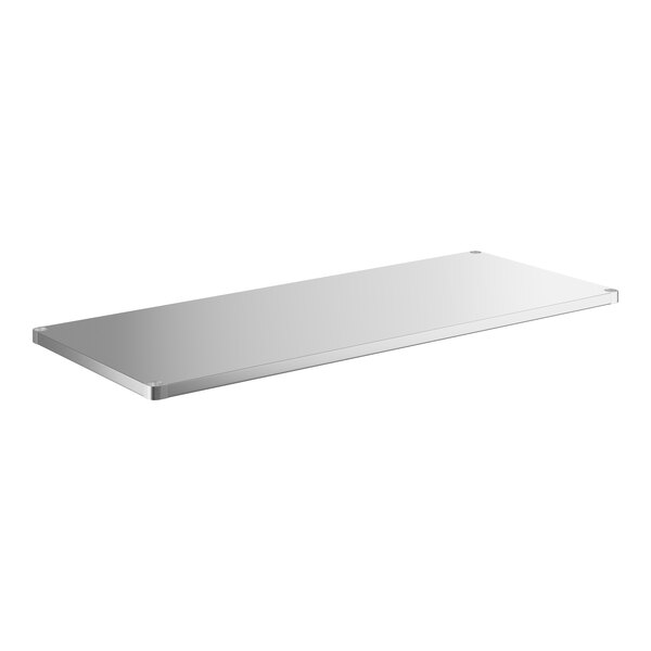 A stainless steel rectangular undershelf.