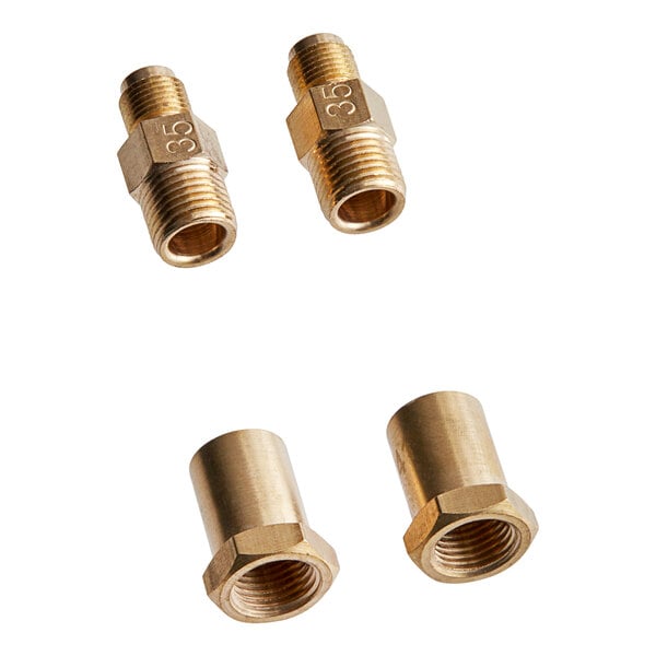 A brass pipe connector and two brass threaded fittings with nuts.