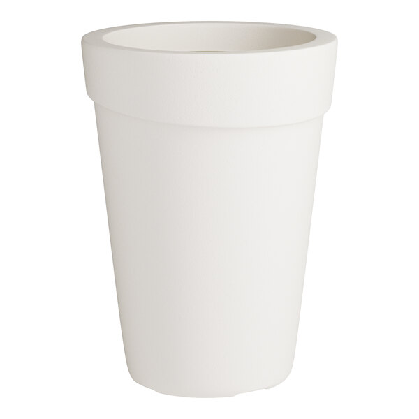A close up of a white cylinder planter with a round top.