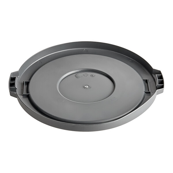 A round grey lid for a 10 gallon trash can with a circle in the middle.