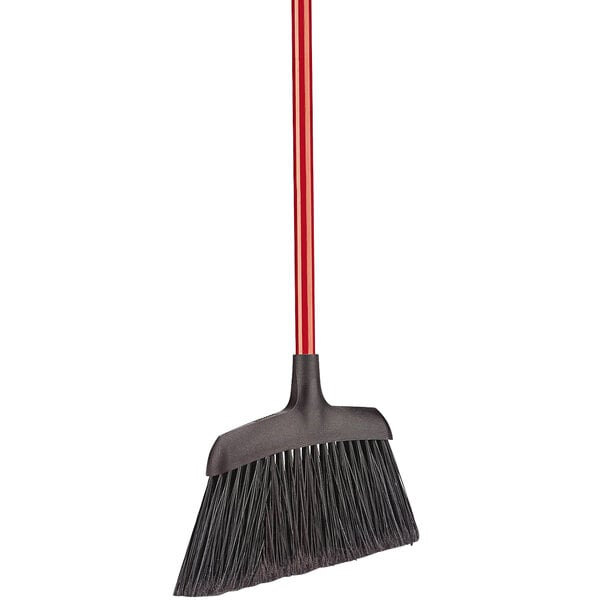 A close-up of a Libman commercial angle broom with a red and black handle.