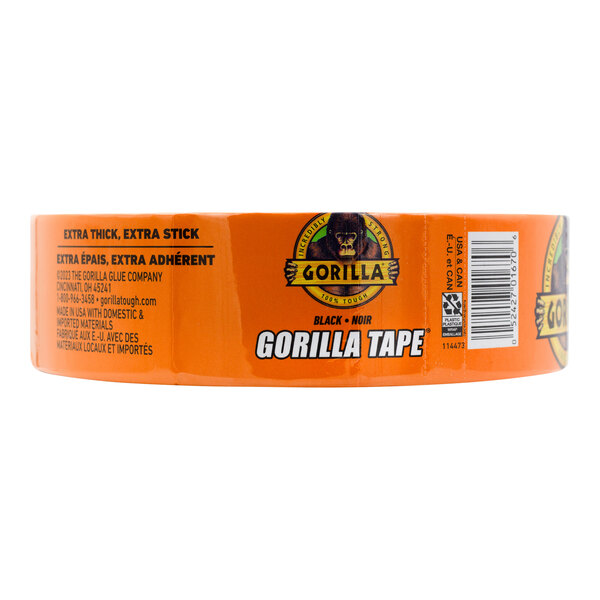 A close up of a box of black Gorilla duct tape with orange lettering.