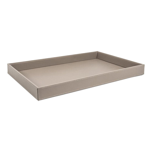 A room360 London rectangular stone faux leather tray with a stitched beige edge on a table with a white surface.