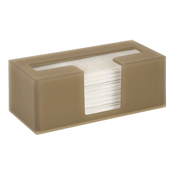 A brown plastic holder with a stack of white paper towels inside.