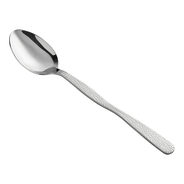 An American Metalcraft hammered stainless steel solid spoon with a long handle.