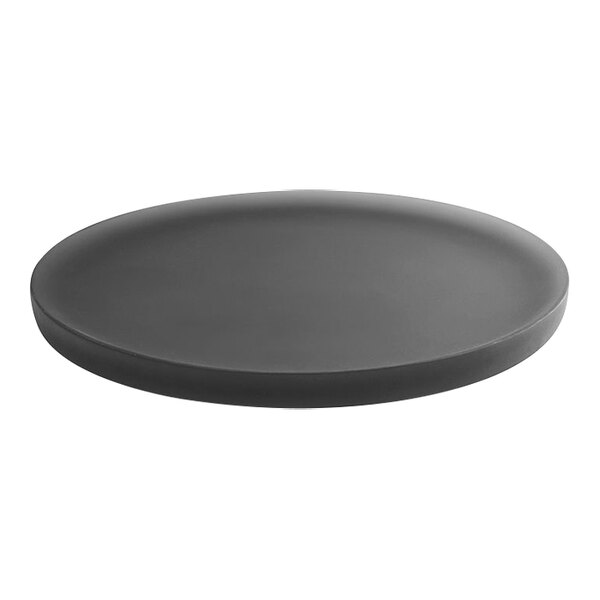 A room360 Nassau smoke resin amenity tray with a circular rim.