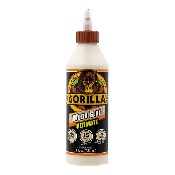 A close up of a white Gorilla wood glue bottle with a brown cap.