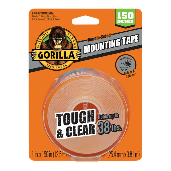 A package of Gorilla Tough & Clear Mounting Tape with a roll of clear tape inside.