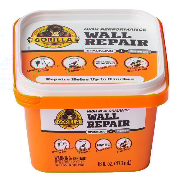 A container of Gorilla wall repair spackling and primer.