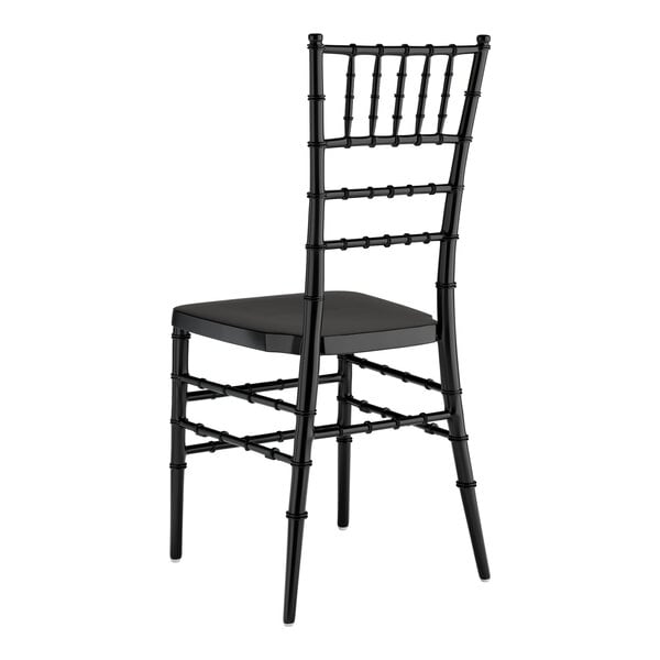 A Lancaster Table & Seating black resin chiavari chair with a black seat.