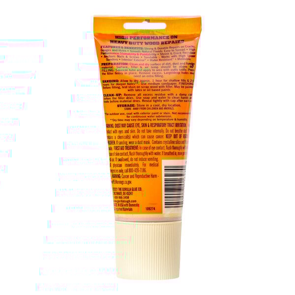 A close up of a tube of Gorilla Natural Wood Filler with an orange label.