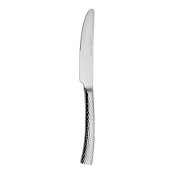 A Varick Malcolm stainless steel dinner knife with a silver handle.