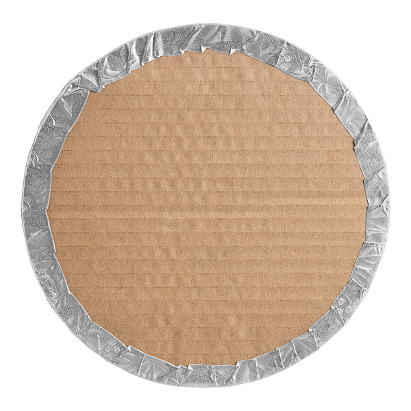 A circular cardboard with silver foil.