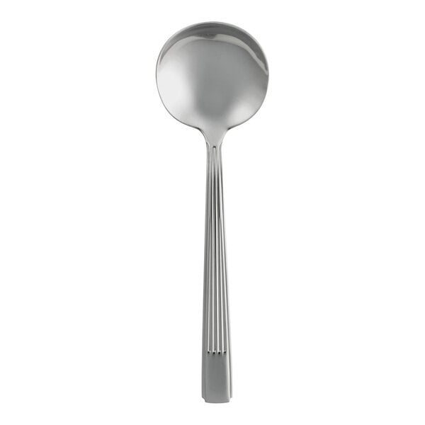 A close-up of a Varick Estate stainless steel soup spoon with a handle.