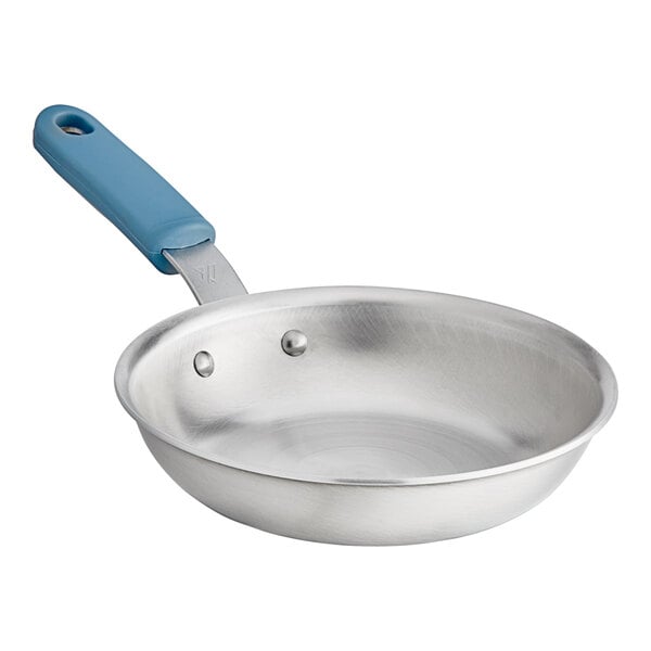 An 8" aluminum frying pan with a natural coating and silicone grip.