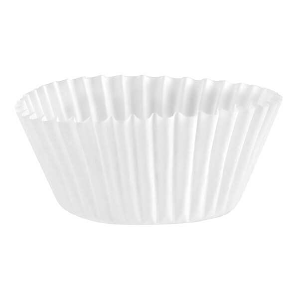 A close-up of a white fluted paper cupcake liner.