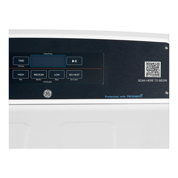 A white rectangular GE commercial dryer with black and white buttons and a screen.